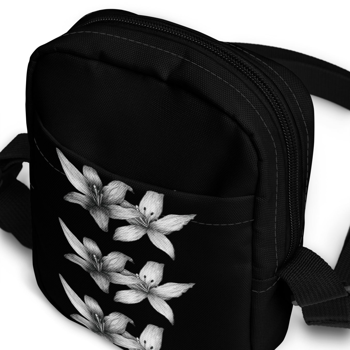 Intricate floral design hand-drawn art black crossbody front pocket view, by Briseis Gifts